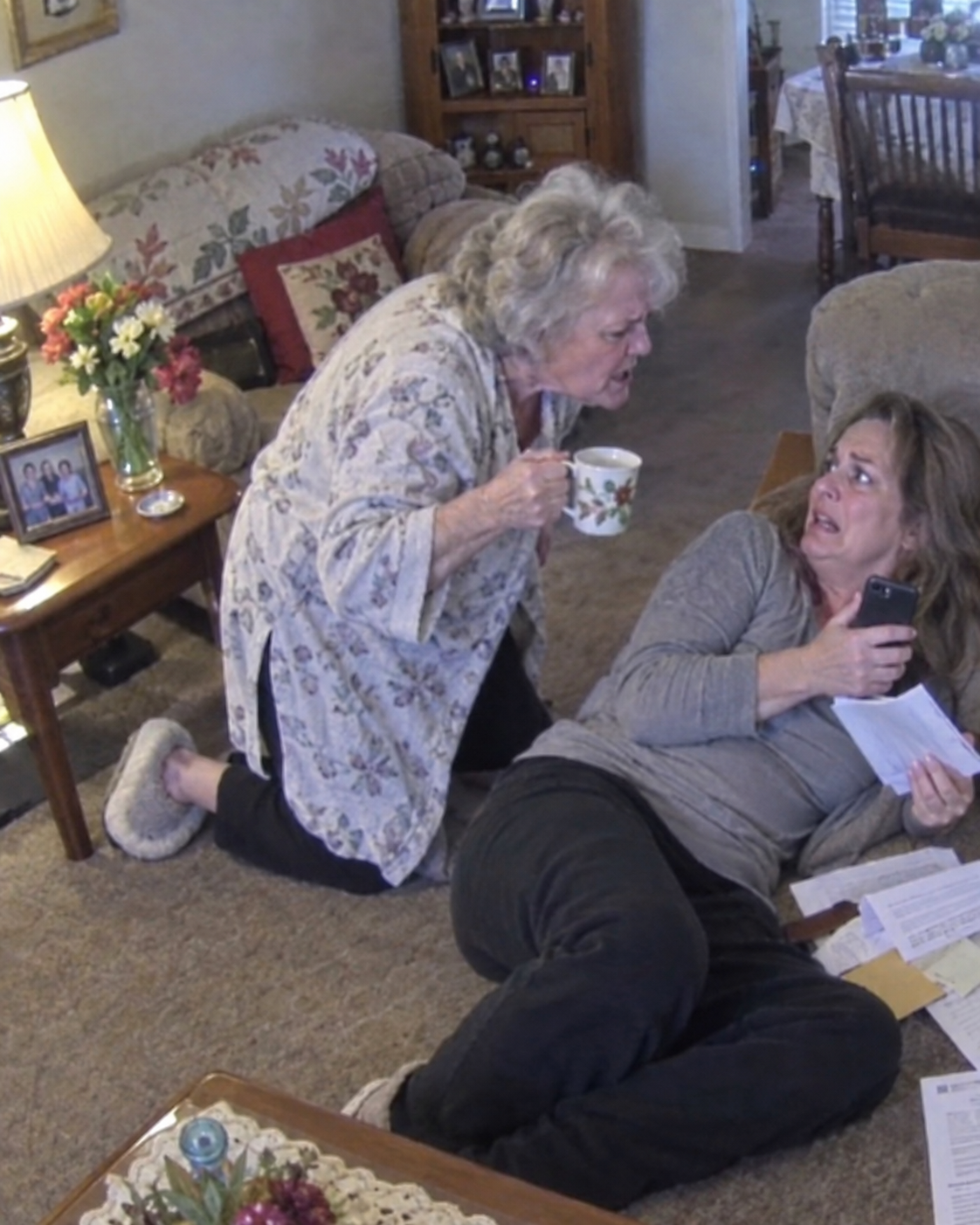 I was lying paralysed on the living room floor from a sudden, severe allergic reaction when my mother-in-law knelt down and deliberately poured her scalding hot tea over my trembling chest. “Die quietly, trash, so my son can finally collect your life insurance and marry a woman with breeding,” she whispered maliciously, digging her long nails into my freshly blistered skin. I stared straight through her, my pulse dangerously low but my mind racing with razor-sharp clarity. She had no idea the life insurance policy was cancelled months ago, and the motion-sensor security cameras she thought she had disabled were currently transmitting this attempted murder to the local police.