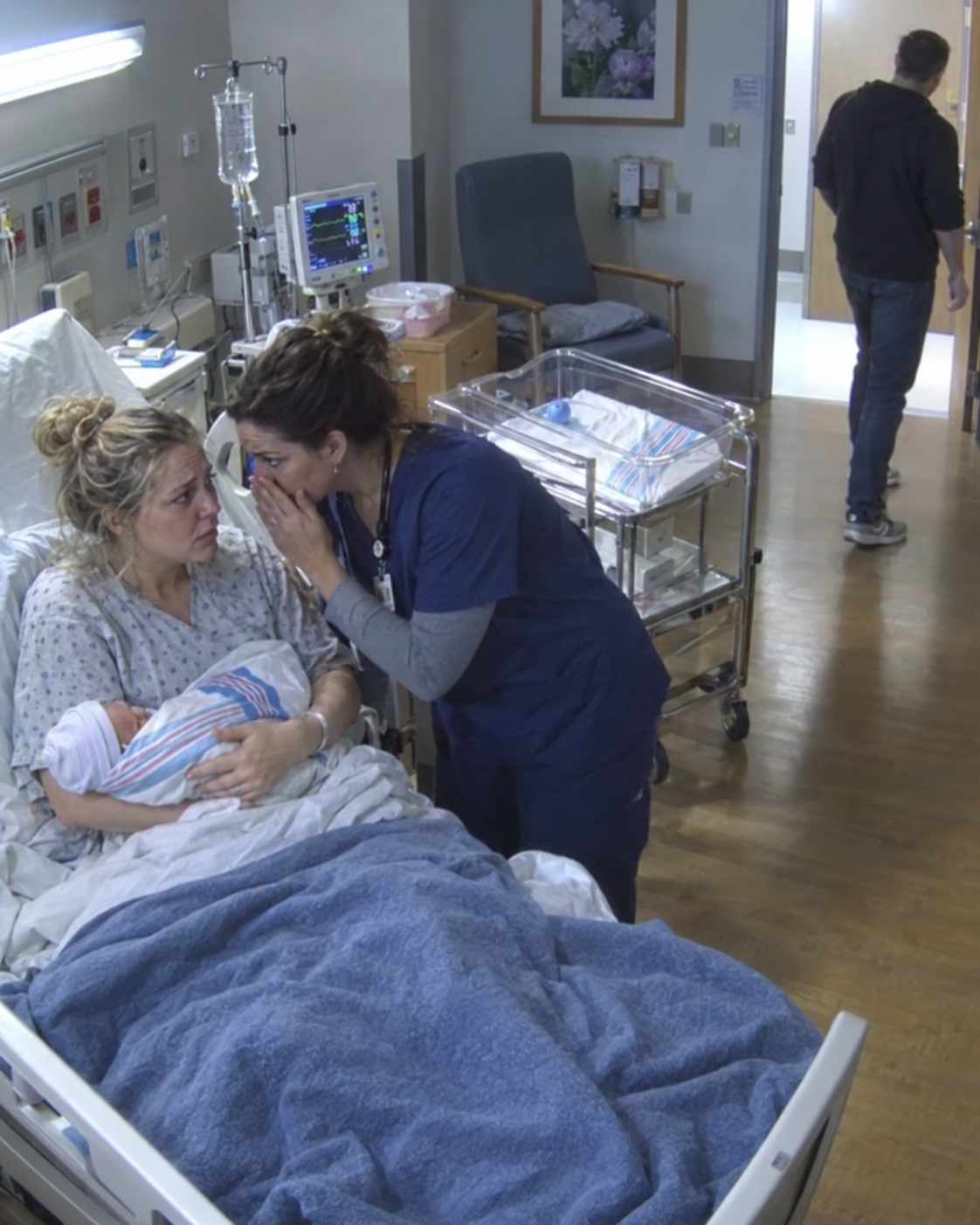 I lost one of my twin babies during labor—when the nurse placed my surviving son in my arms, she leaned in and whispered, “Watch the video I just sent you before you trust your husband.”